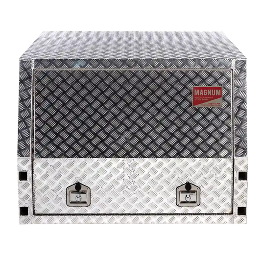 Metal toolbox with diamond plate pattern and Magnum branding on a white background